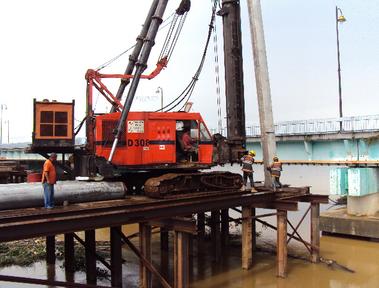 Piling works on barge