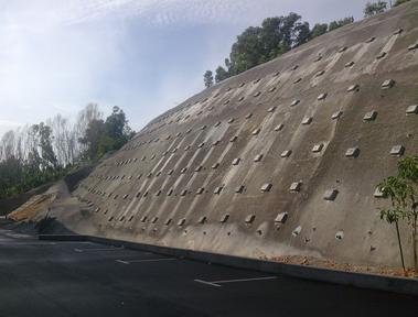 Soil nail reinforced slope